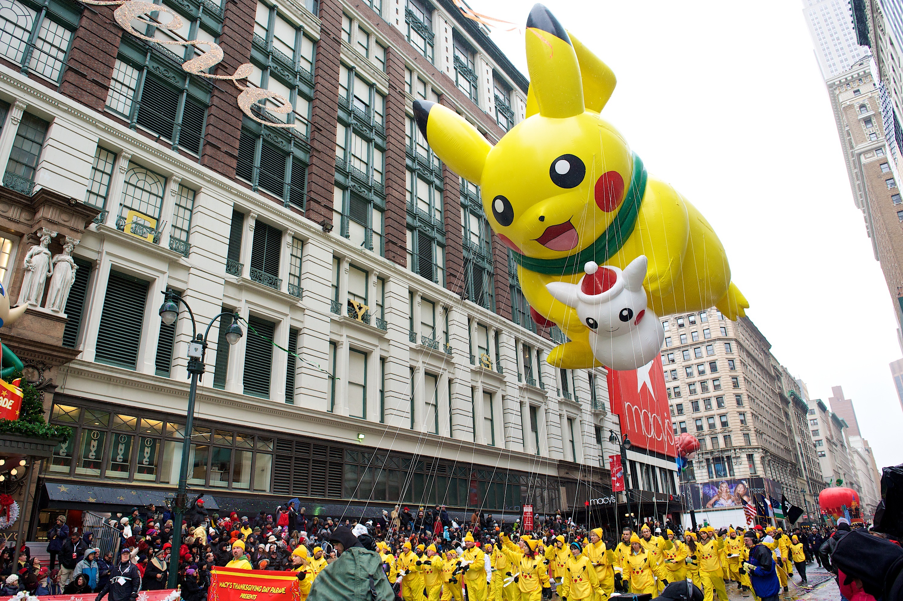 Macy's Thanksgiving Day Parade with colorful balloons, a beloved US Thanksgiving tradition