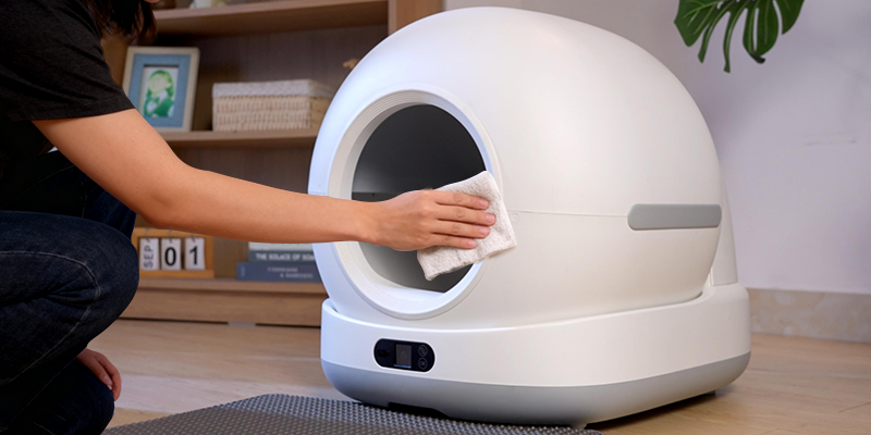 Troubleshooting a smart pet device battery - cleaning charging port